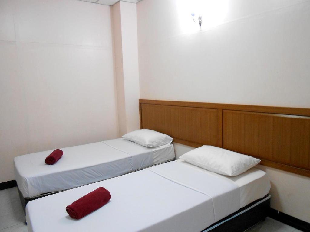 Four Sons Village Bangkok Chambre photo