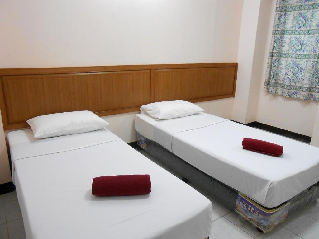 Four Sons Village Bangkok Chambre photo